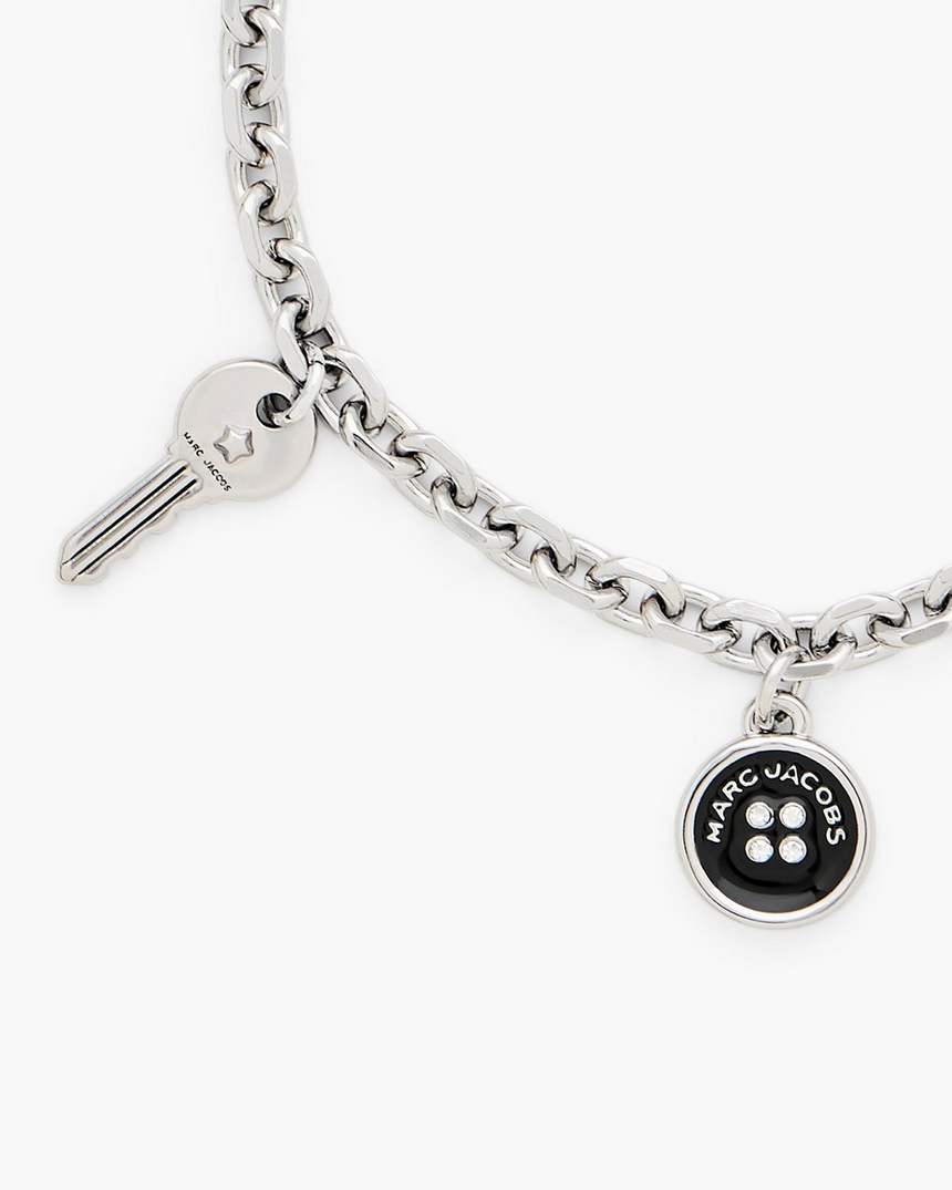 pulseira com pingente de botão