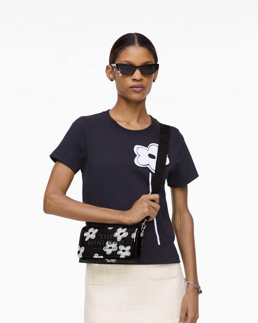 a mini bolsa daisy