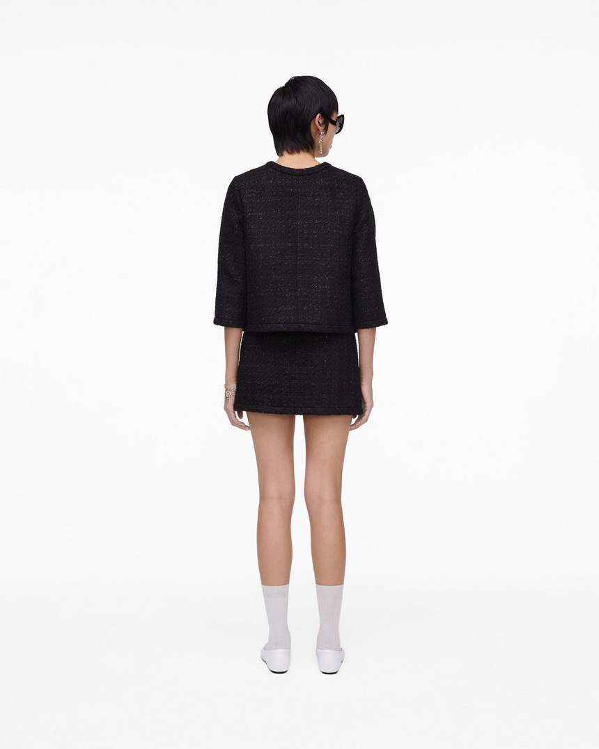 jaqueta feminina de tweed com corte invertido