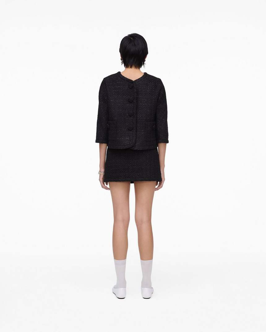 jaqueta feminina de tweed com corte invertido