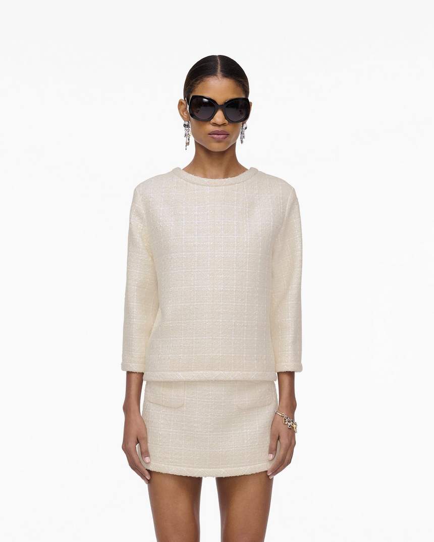 jaqueta feminina de tweed com corte invertido