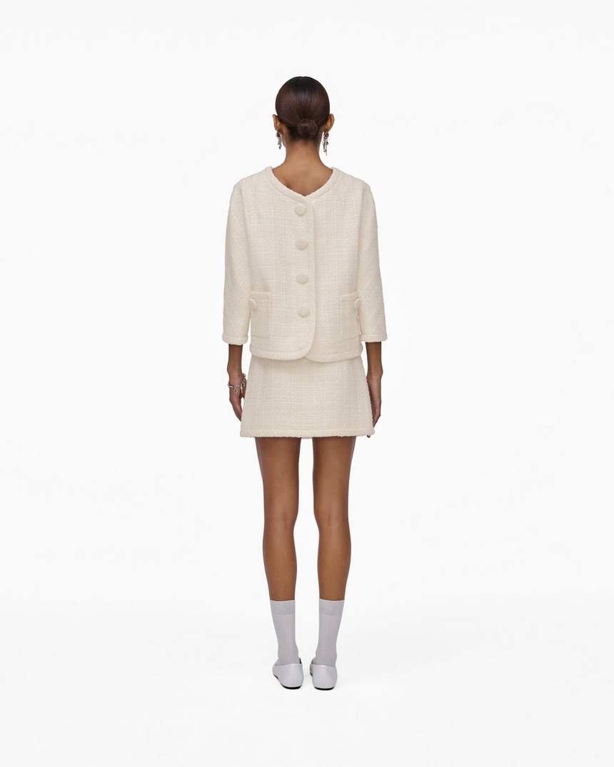 jaqueta feminina de tweed com corte invertido