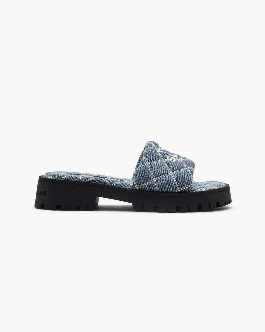 o chinelo de denim acolchoado com sola tratorada