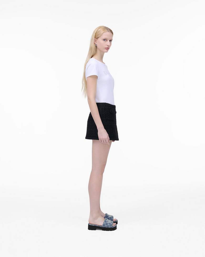 o chinelo de denim acolchoado com sola tratorada