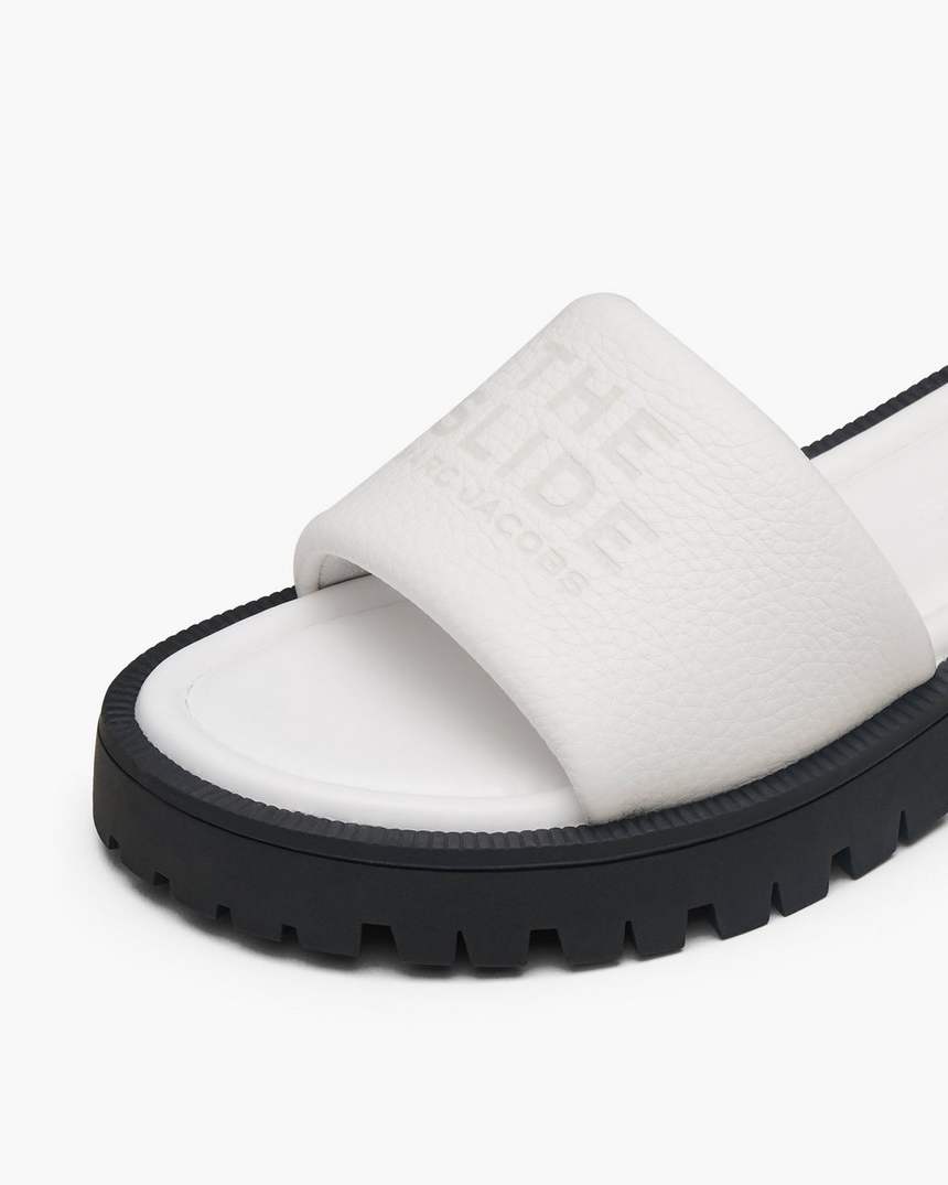 o chinelo com sola tratorada