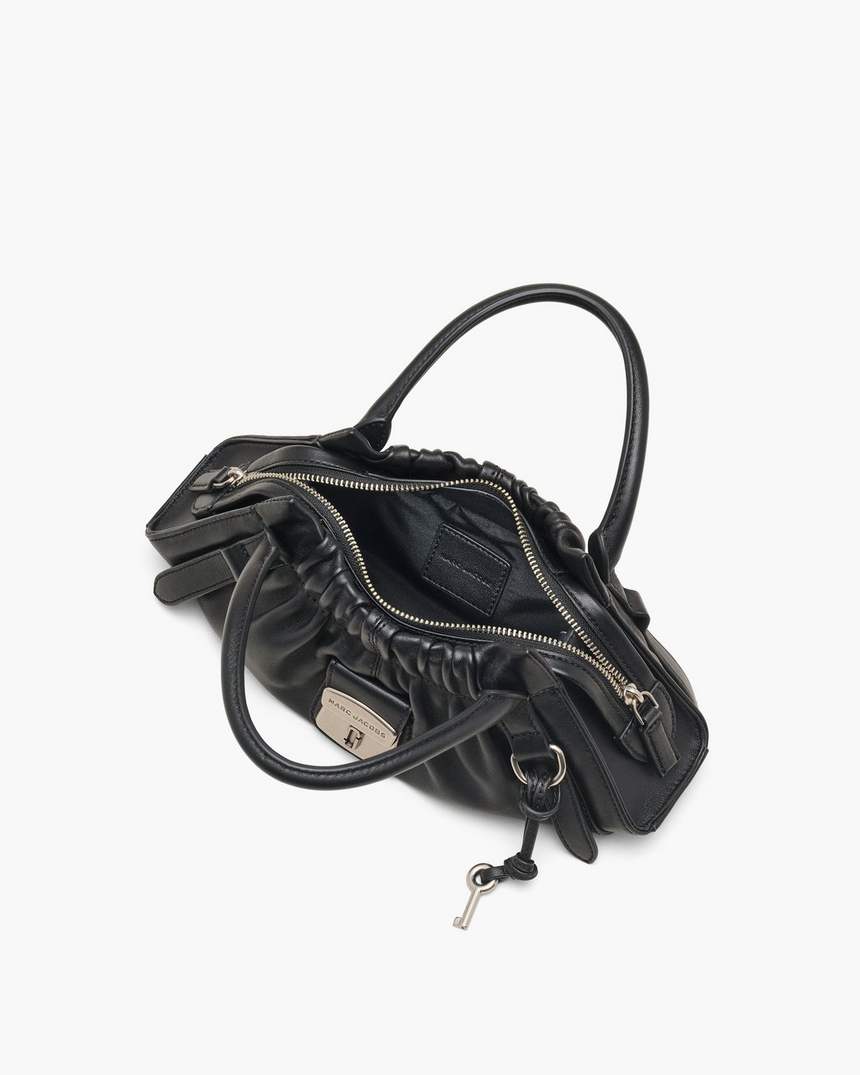 a pequena bolsa cristina