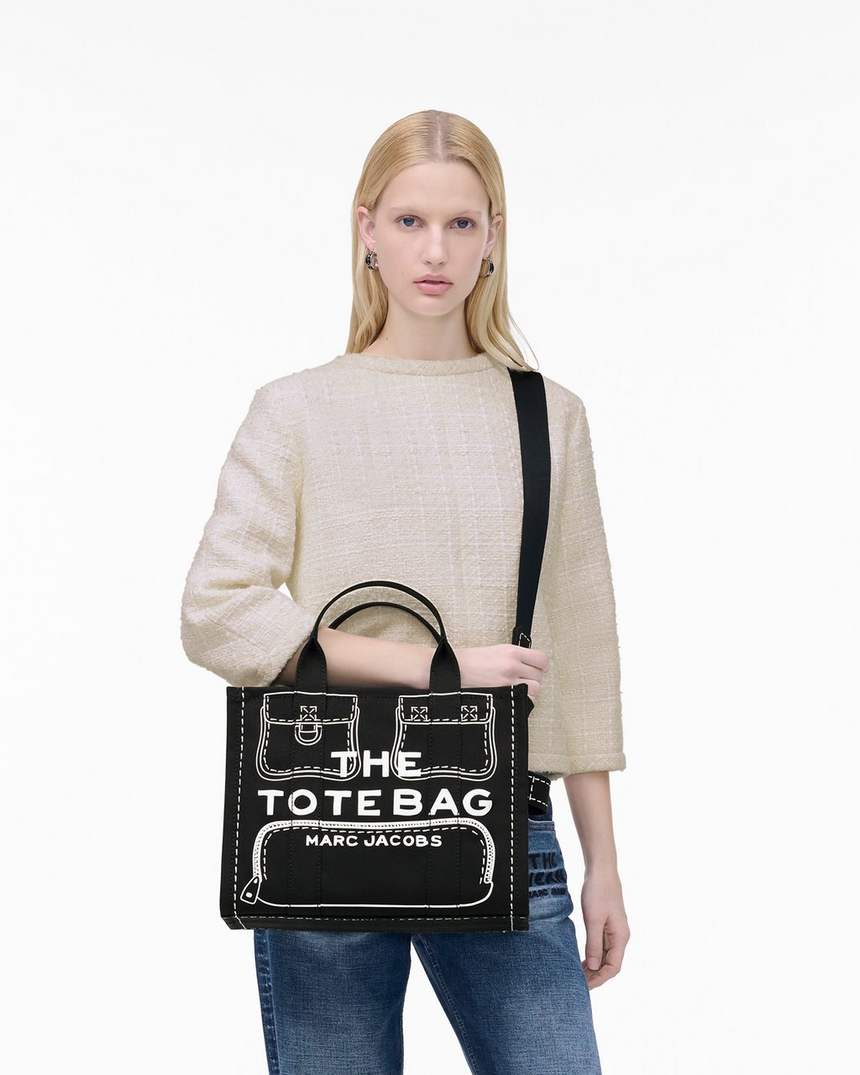 bolsa tote média em lona com estampa trompe loeil
