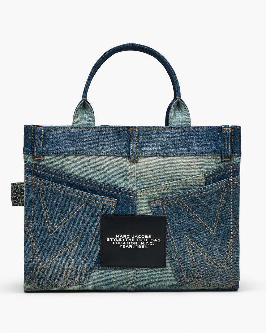 bolsa tote média em jeans desconstruído