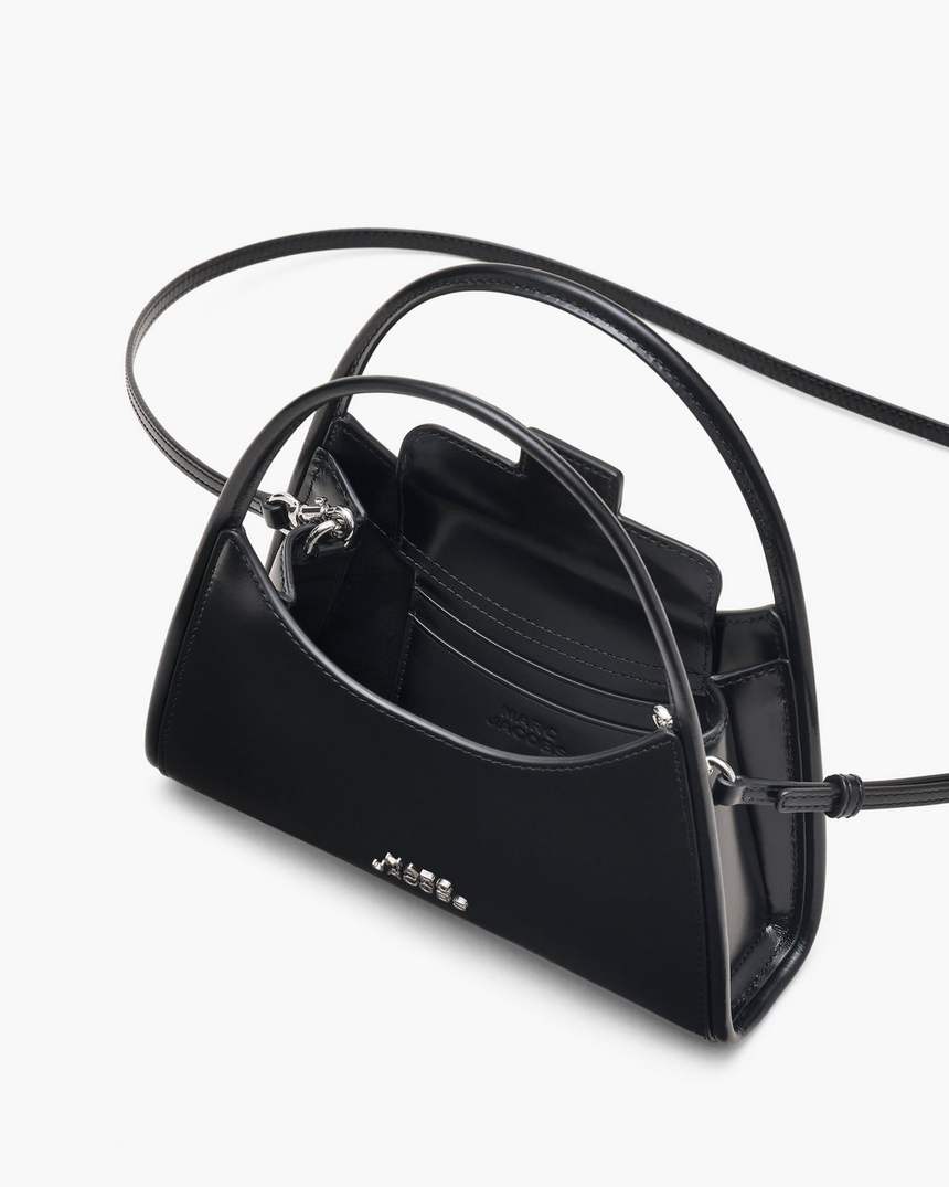 bolsa transversal com fecho de garra
