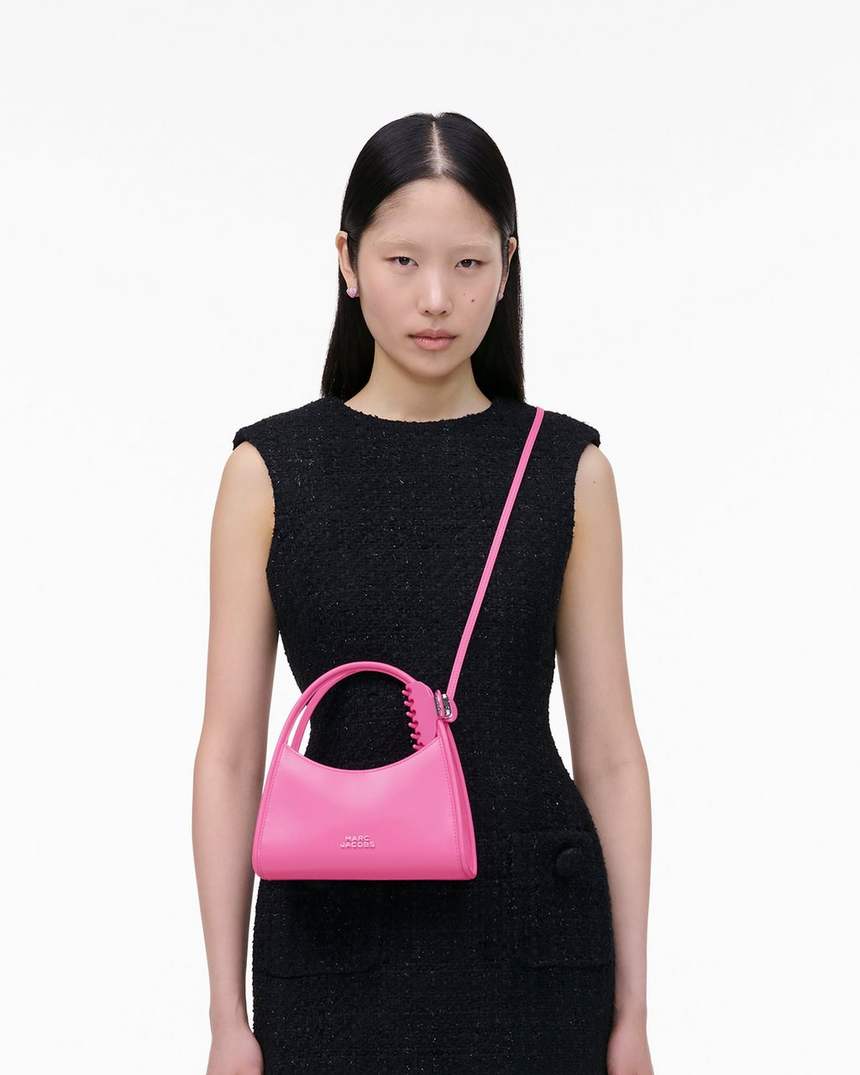 bolsa transversal com fecho de garra